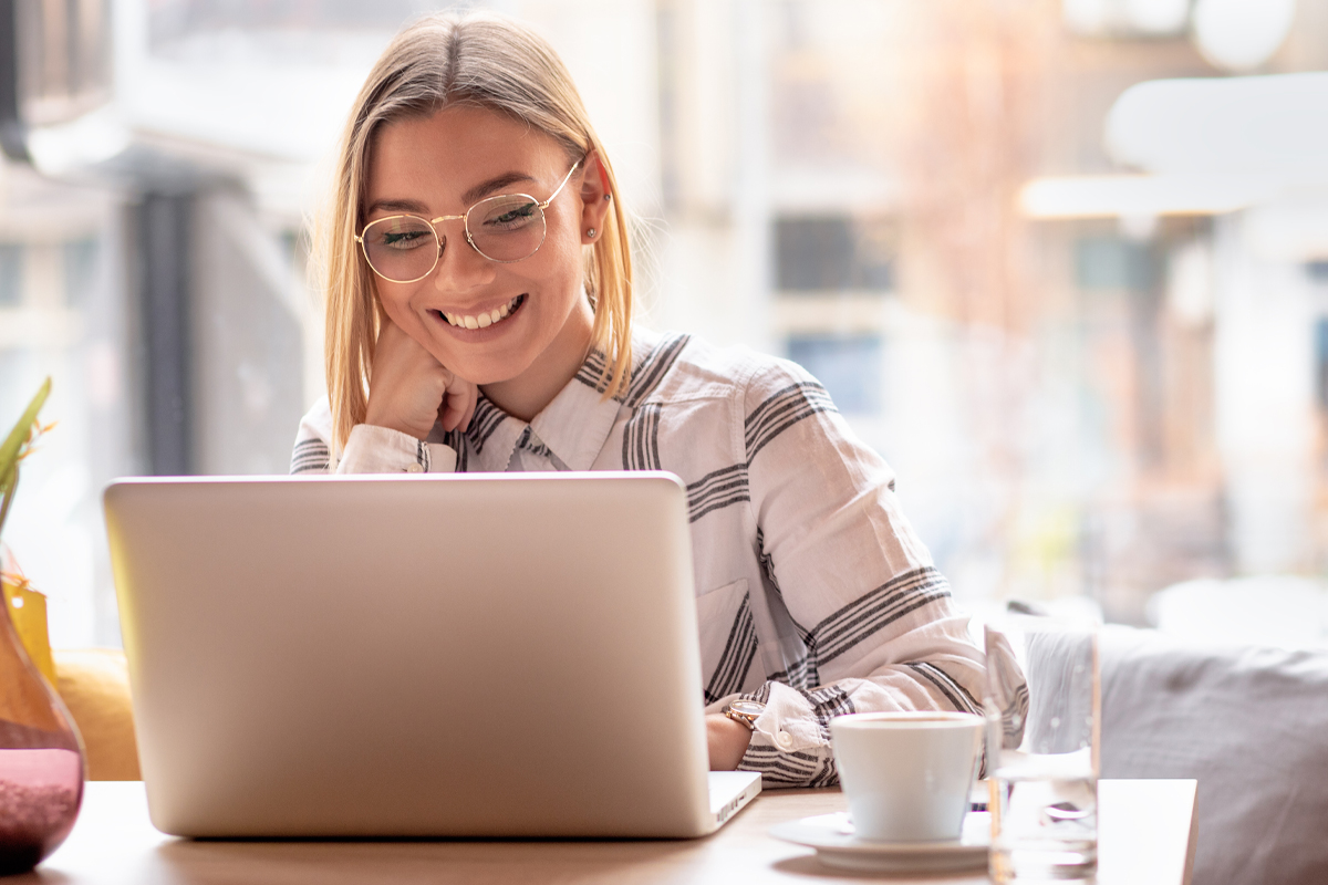 woman searching google on laptop